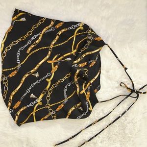 Brand is by “Mistyrose”. Satin blouse, new, and never worn.